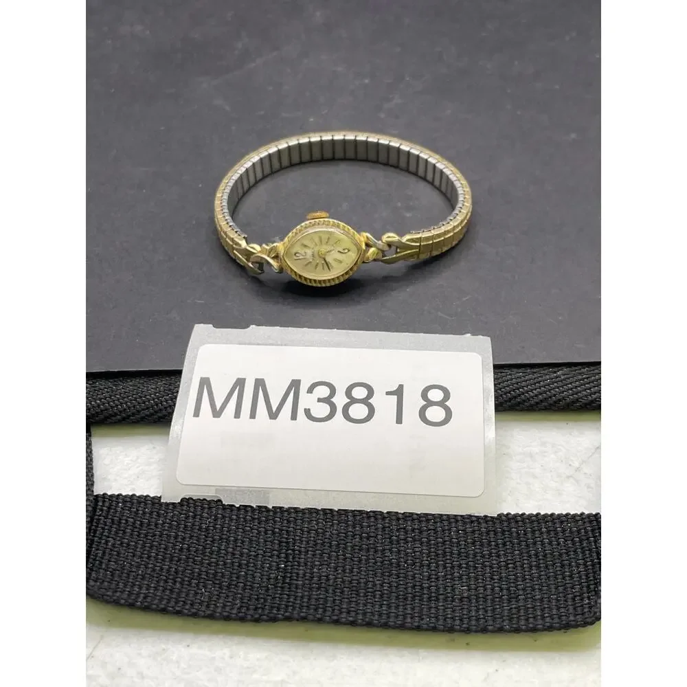Vintage Timex Watch Women's Gold Tone Round Stretch Band Manual Wind Up 16mm